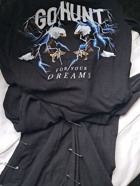 Sexy ashion Nova Jumpsuit With Sheer Sleeves, Slit Legs Fastened Safety Pins.